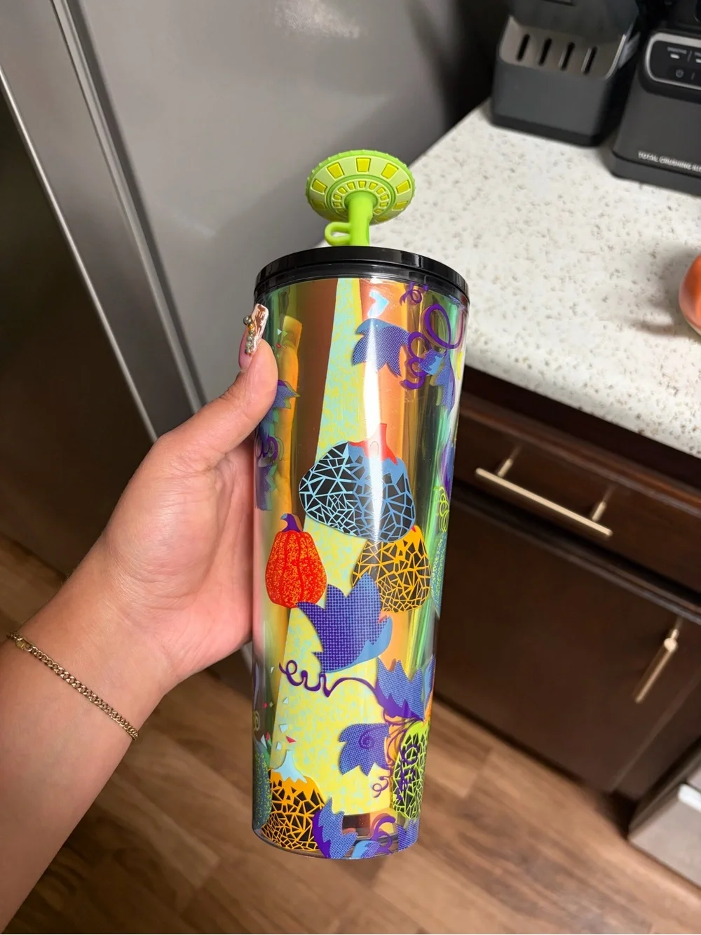 Starbucks Iridescent Tumbler with Neon Green Lid and Multi-Color Fruit Motifs